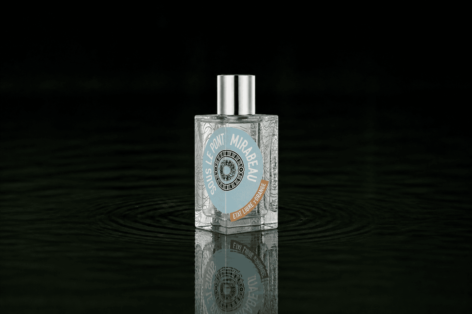 Etat Libre D'Orange Etat Libre D' Orange - Sous le Pont Mirabeau fragrance bottle floating above dark water
