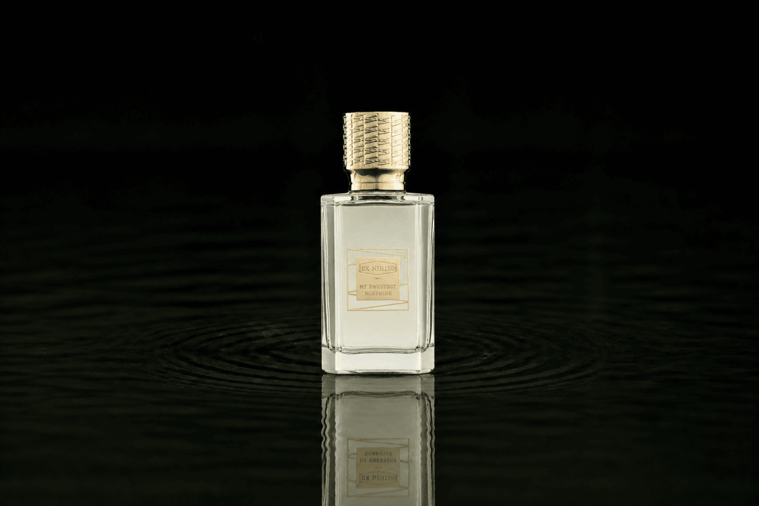 Ex Nihilo Paris Ex Nihilo - My Sweetest Morphine fragrance bottle floating above dark water
