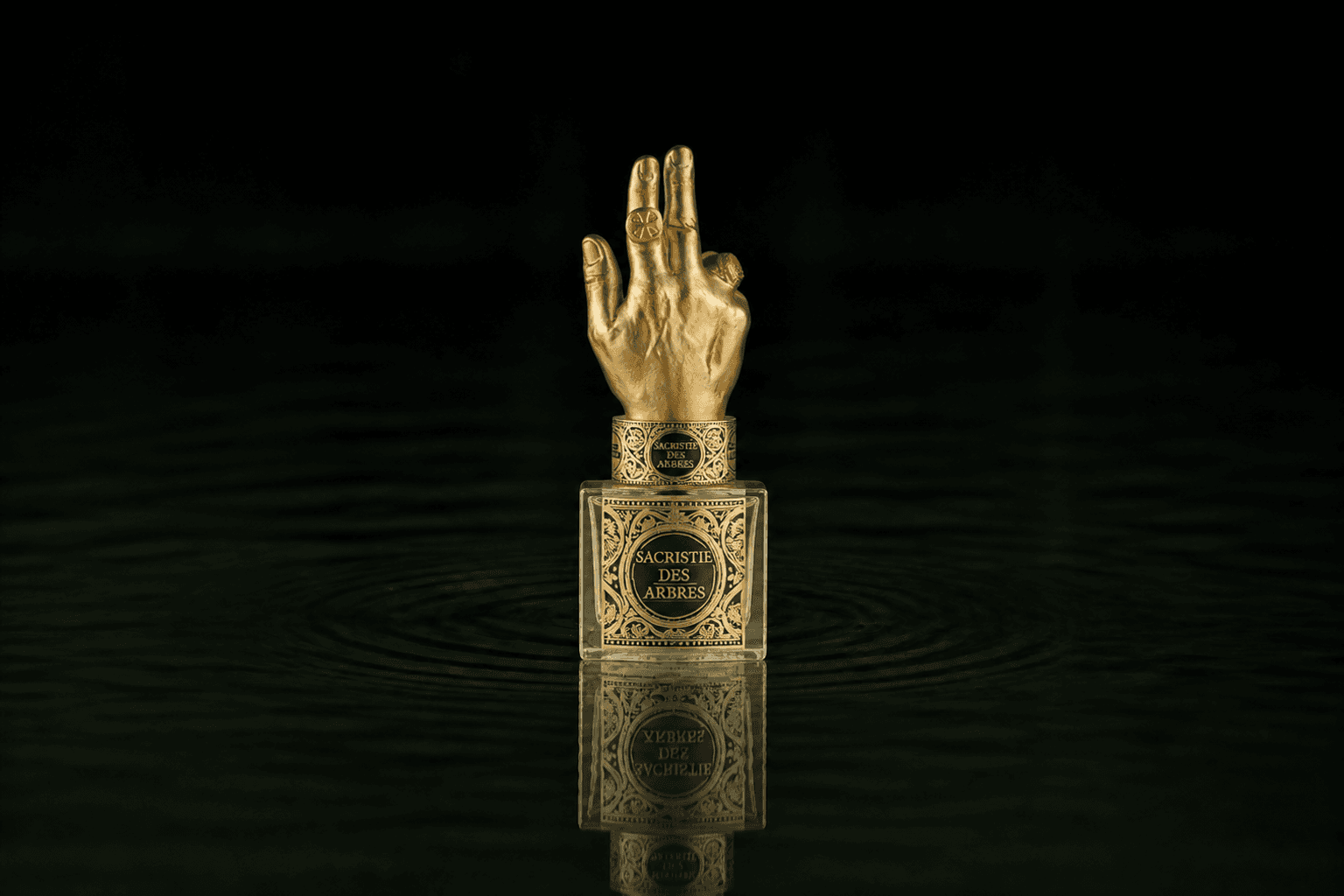 Filippo Sorcinelli Filippo Sorcinelli - Sacristie Des Arbres fragrance bottle floating above dark water