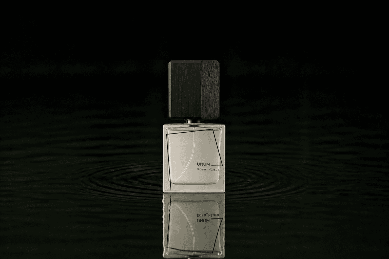 Filippo Sorcinelli Cyber Sex fragrance bottle floating above dark water