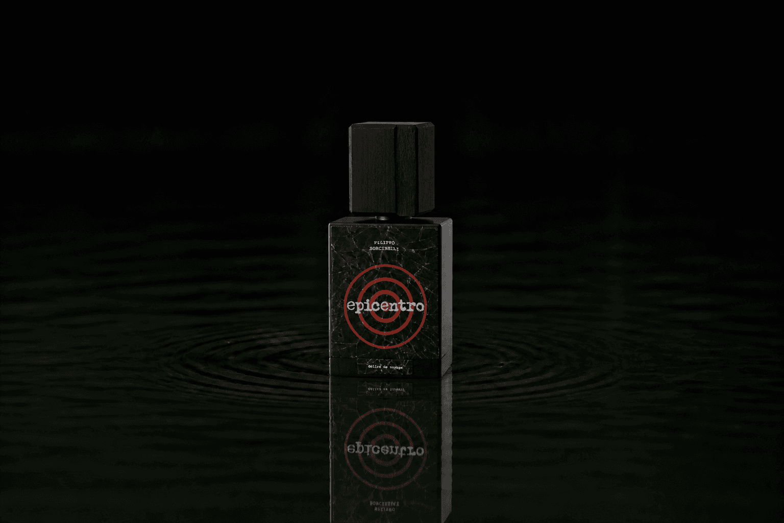 Filippo Sorcinelli Epicentro fragrance bottle floating above dark water