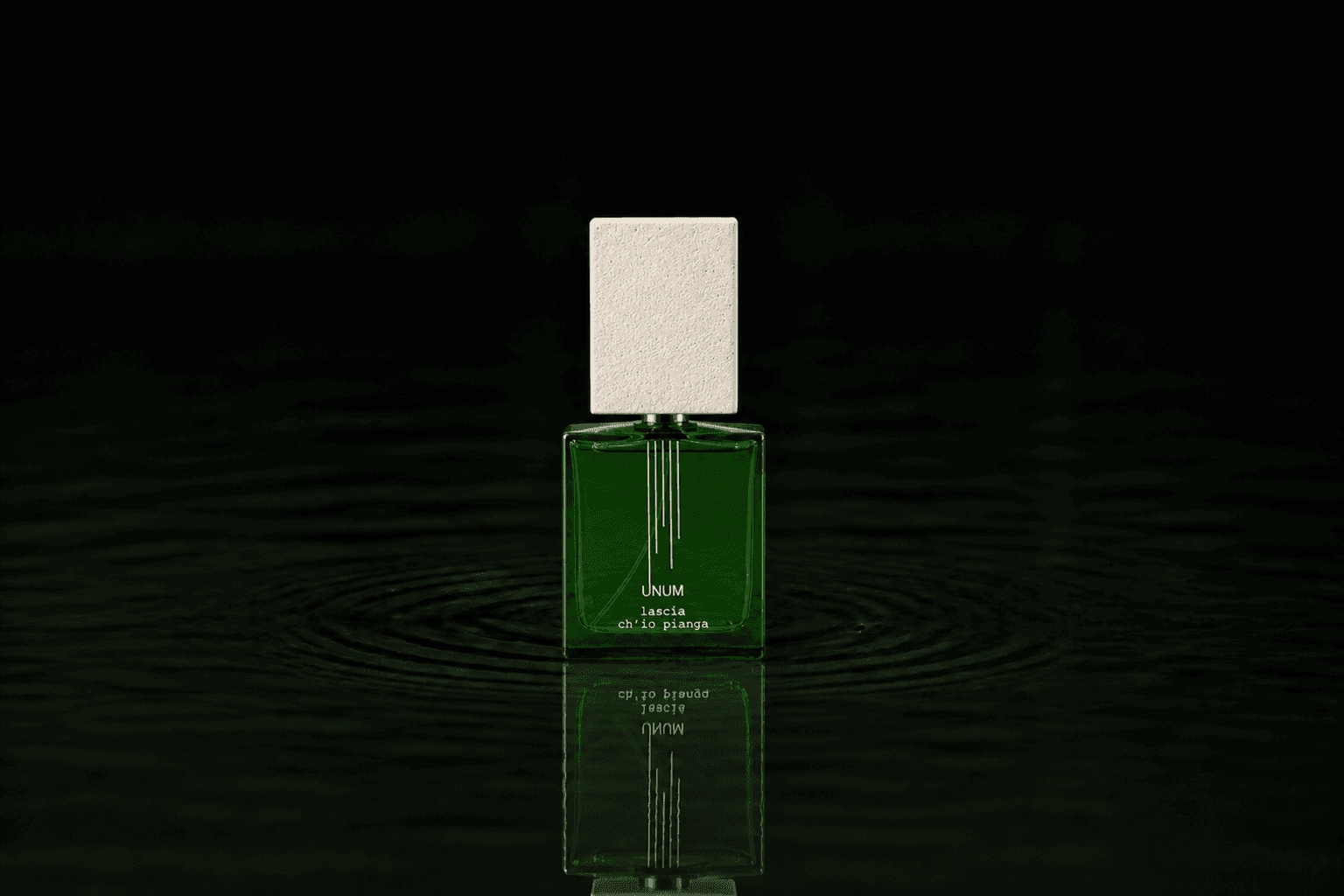 Filippo Sorcinelli Lascia Che Io Pianga fragrance bottle floating above dark water