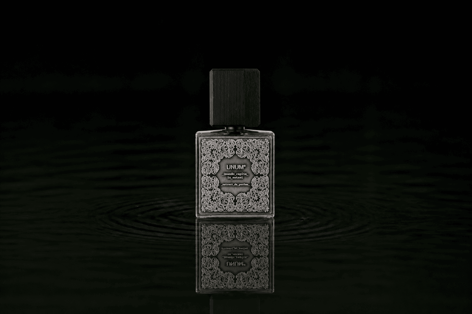 Filippo Sorcinelli Quando Rapita In Estasi fragrance bottle floating above dark water