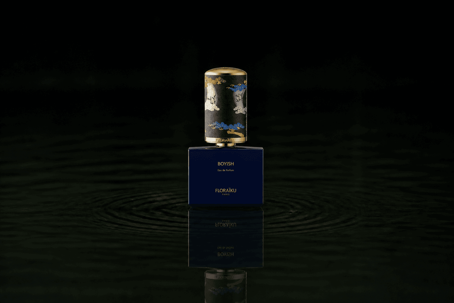 Floraiku Boyish fragrance bottle floating above dark water
