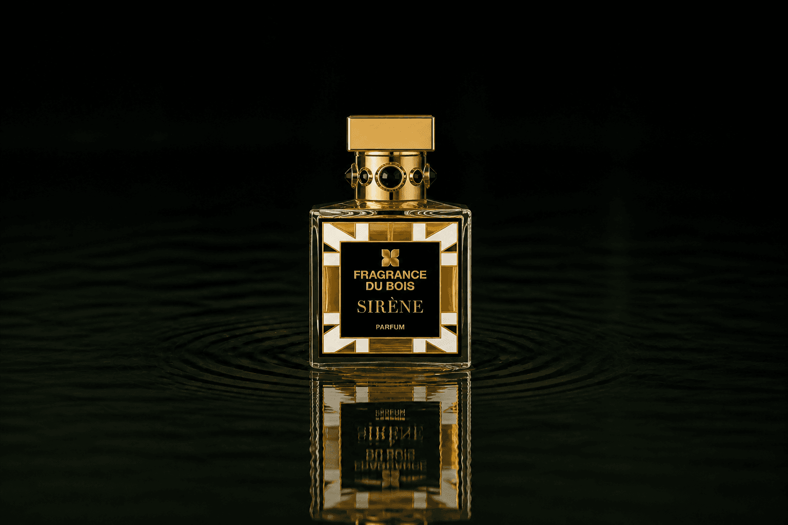Fragrance Du Bois Sirene fragrance bottle floating above dark water