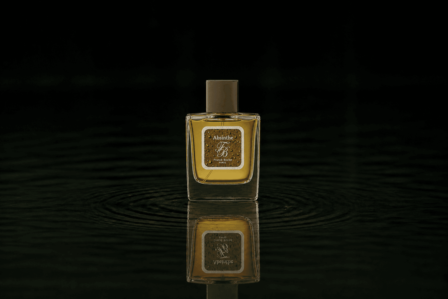 Franck Boclet Absinthe fragrance bottle floating above dark water