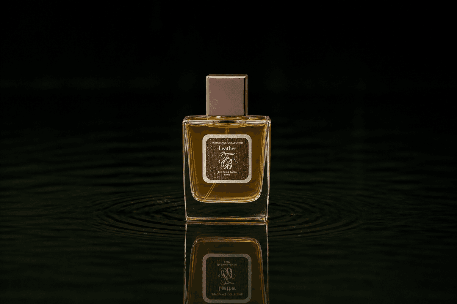 Franck Boclet Leather Elixir fragrance bottle floating above dark water