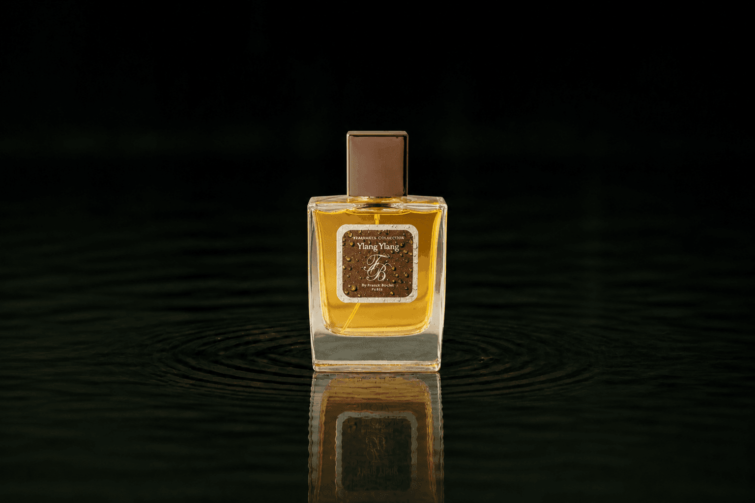 Franck Boclet Rock & Riot Be My Wife fragrance bottle floating above dark water