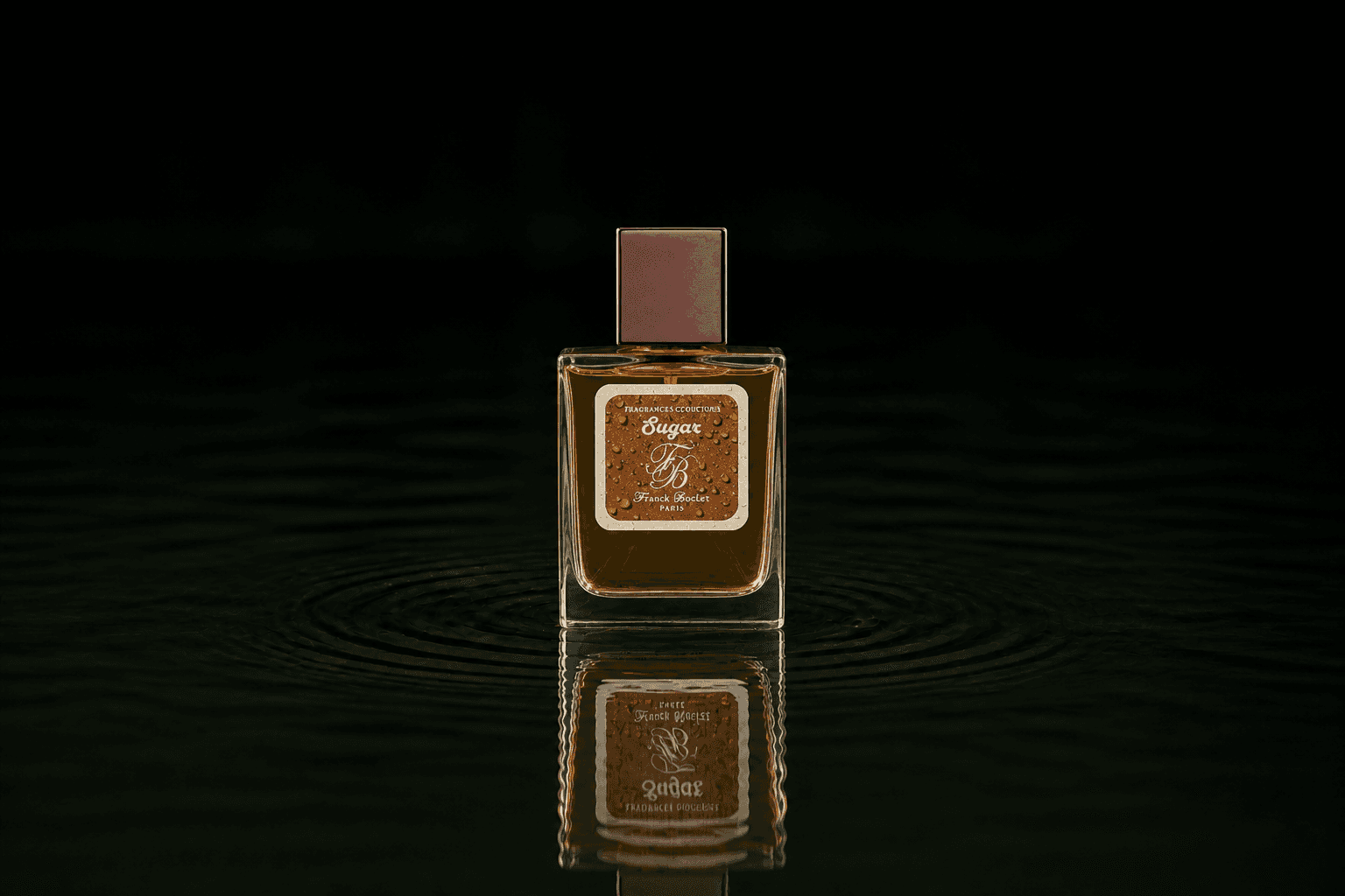 Franck Boclet Rock & Riot Sugar fragrance bottle floating above dark water