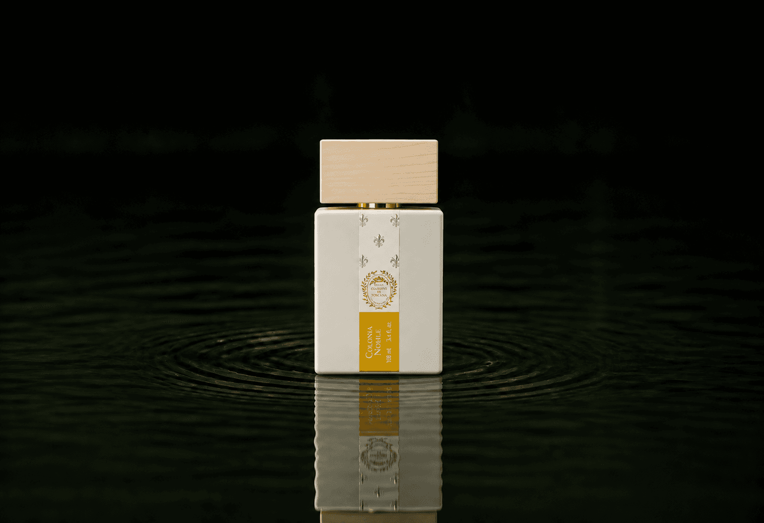 Giardini di Toscana Colonia Nobile fragrance bottle floating above dark water