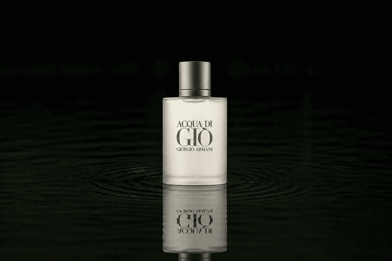 Giorgio Armani Acqua Di Gio fragrance bottle floating above dark water
