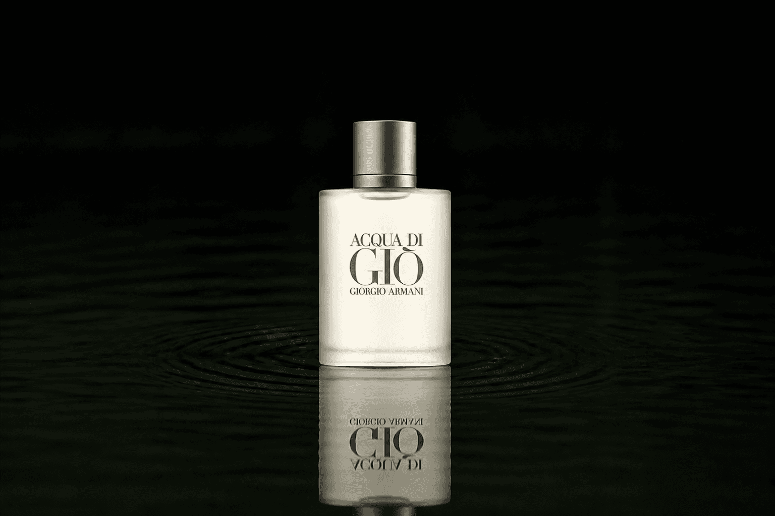 Giorgio Armani Armani - Acqua Di Gio TRAVEL COLLECTION 100ML+ fragrance bottle floating above dark water
