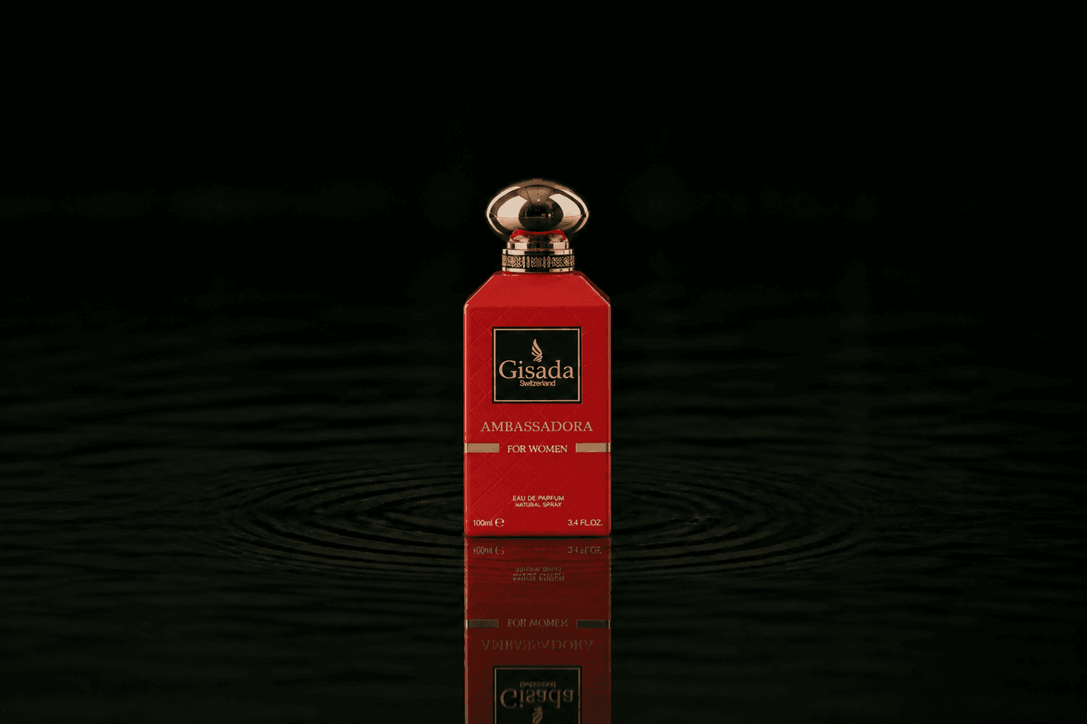 Gisada Ambassadora fragrance bottle floating above dark water
