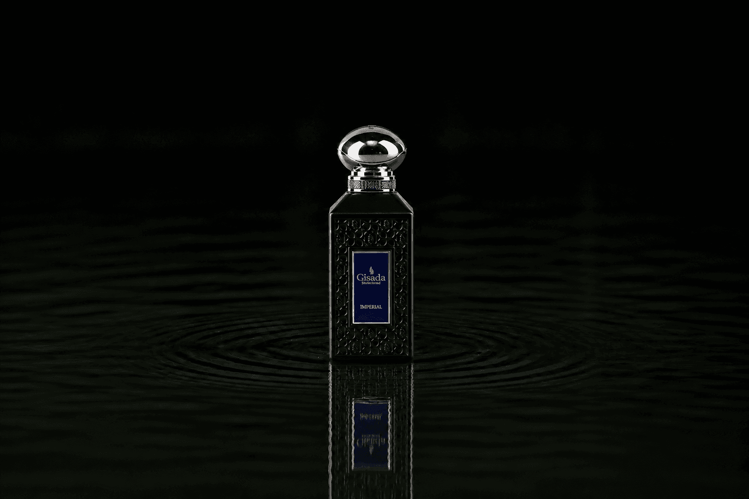 Gisada Luxury Collection Imperial fragrance bottle floating above dark water