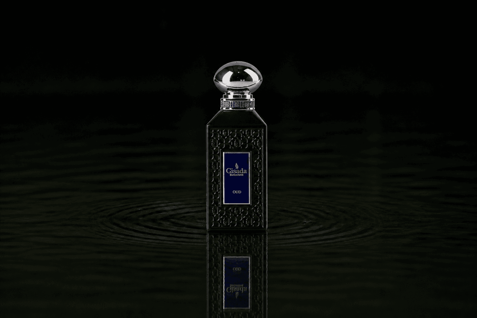 Gisada Luxury Collection Oud Parfum fragrance bottle floating above dark water