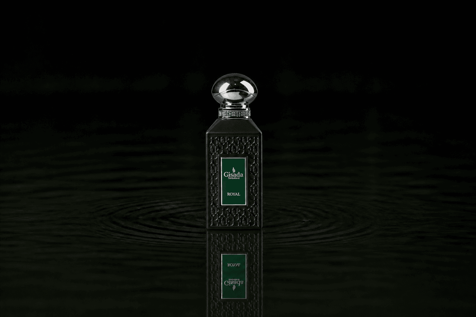 Gisada Luxury Collection Royal fragrance bottle floating above dark water
