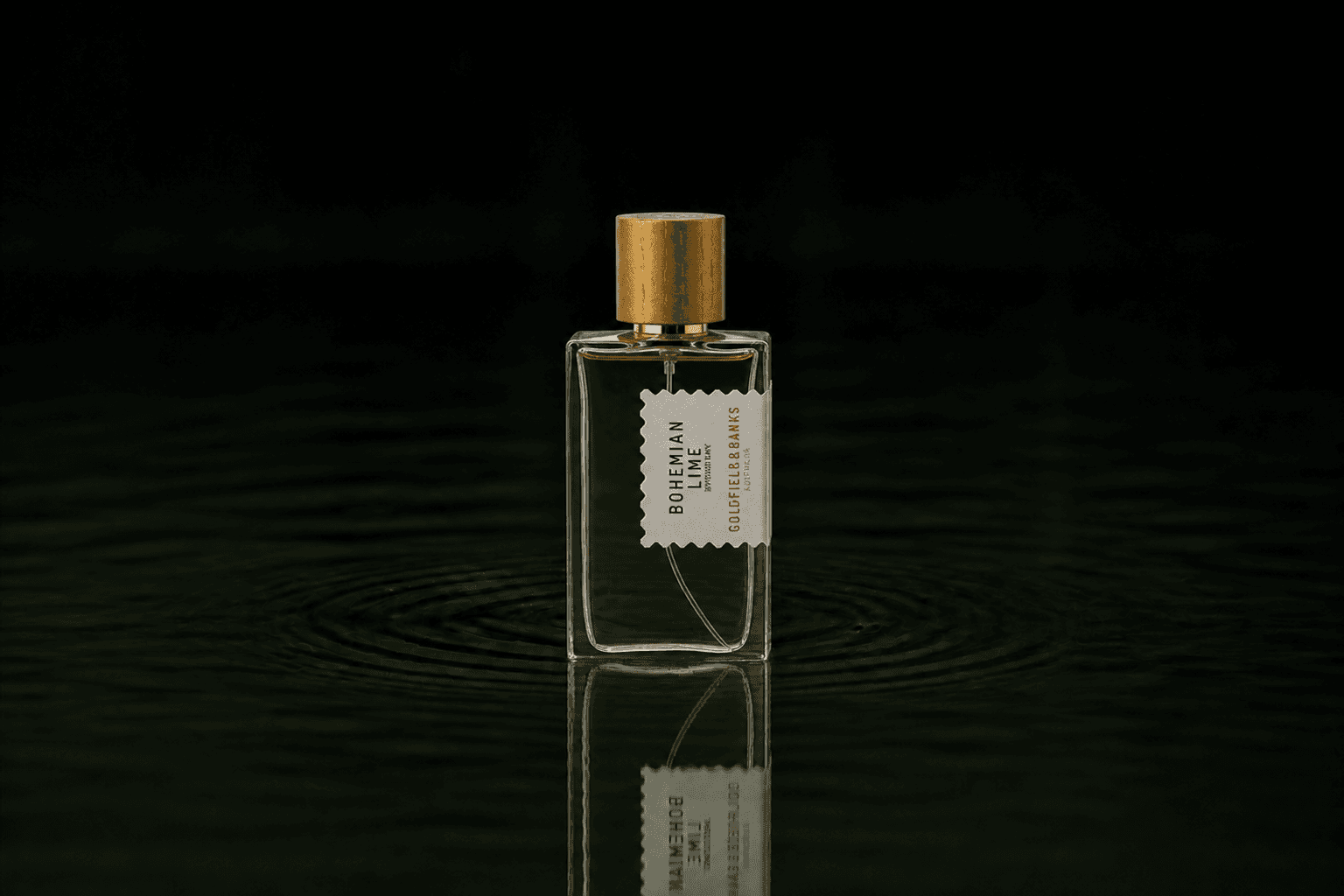 Goldfield & Banks Goldfield and Banks - Bohemian Lime fragrance bottle floating above dark water
