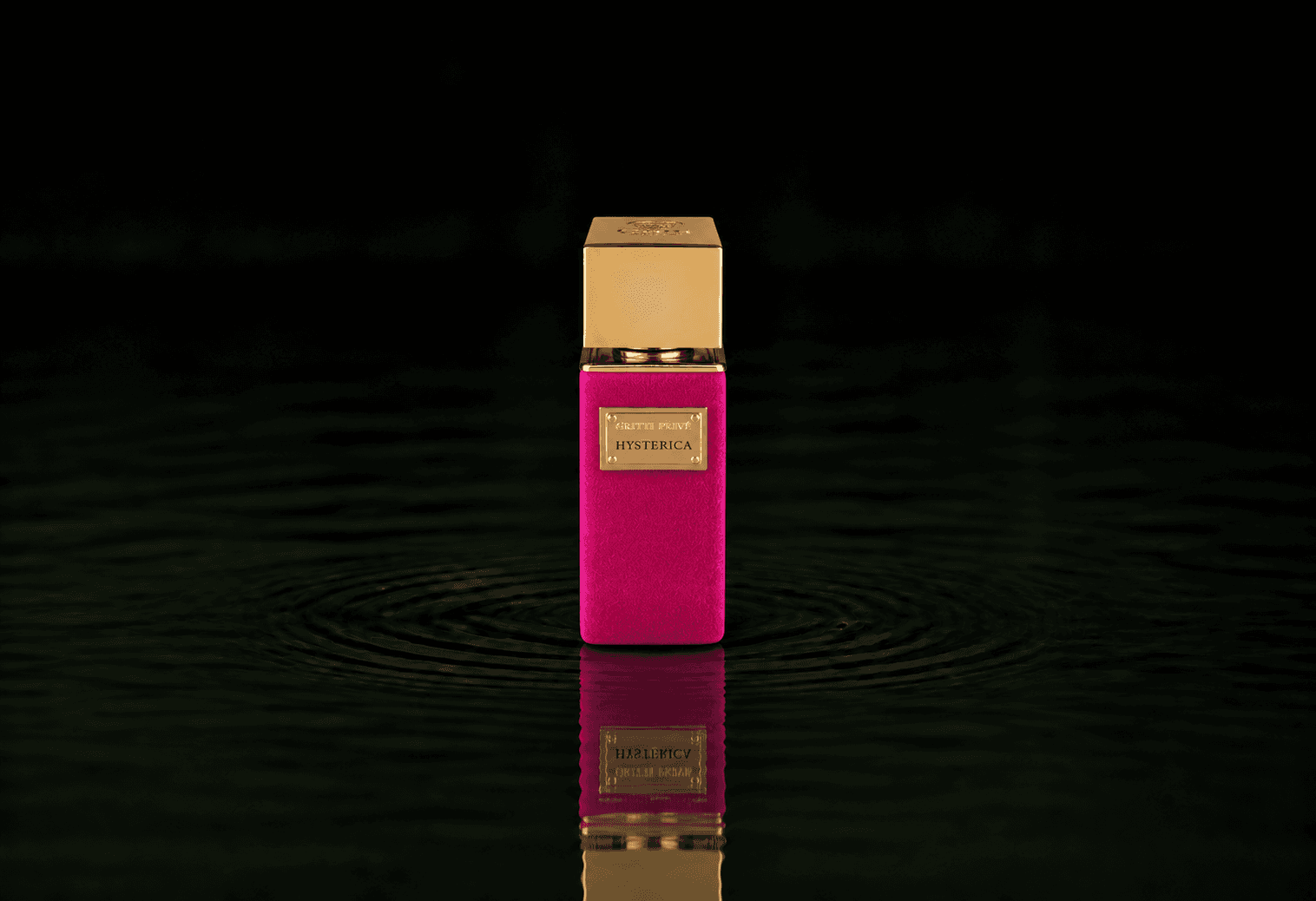 Gritti Hysterica fragrance bottle floating above dark water