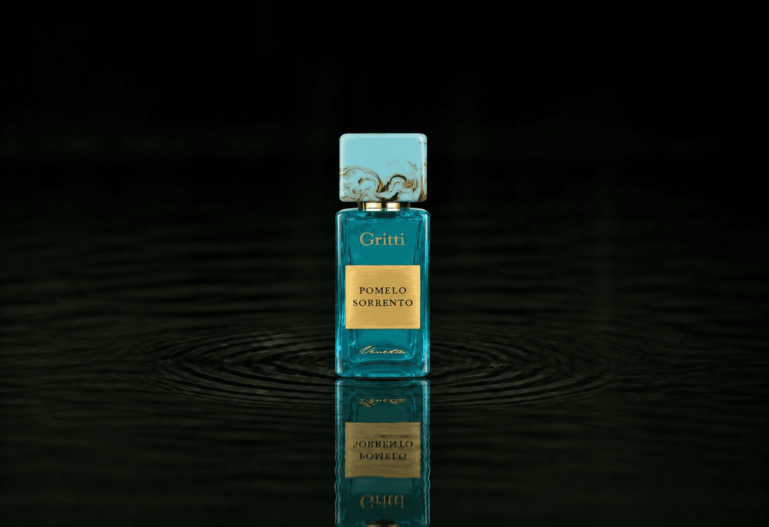 Gritti Pomelo Sorrento fragrance bottle floating above dark water