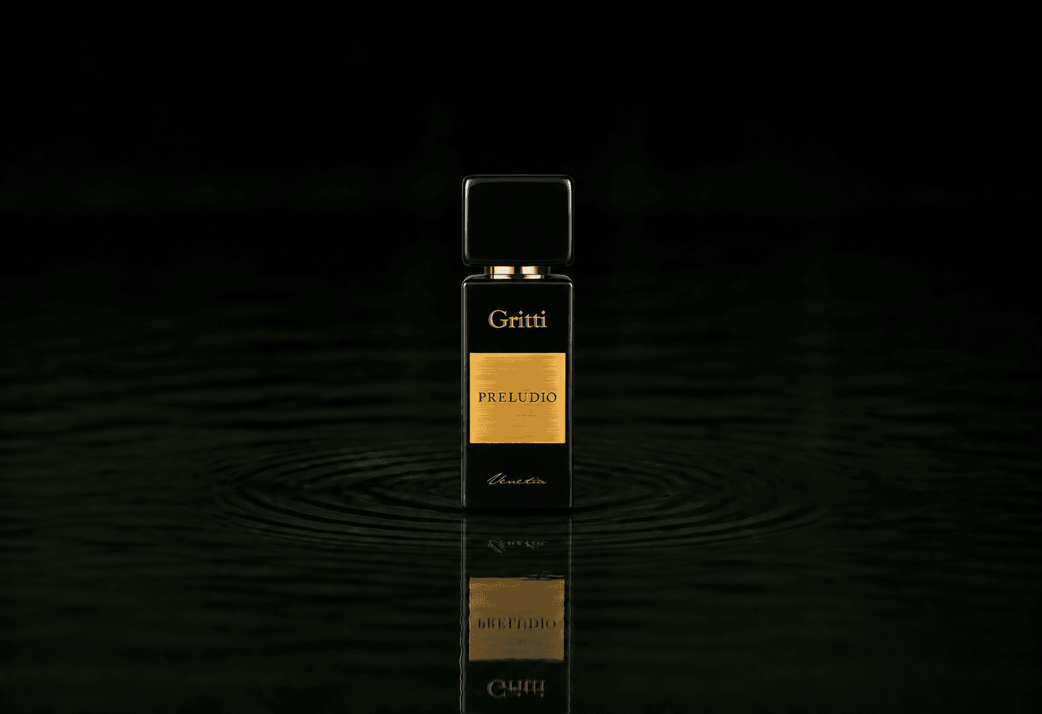 Gritti Preludio fragrance bottle floating above dark water