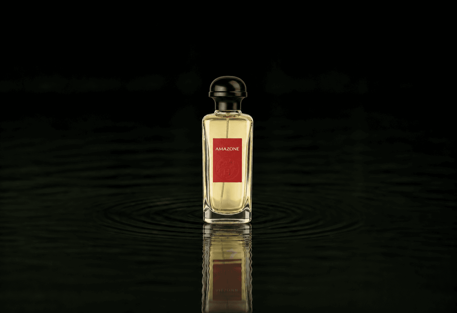 Hermes Amazone fragrance bottle floating above dark water