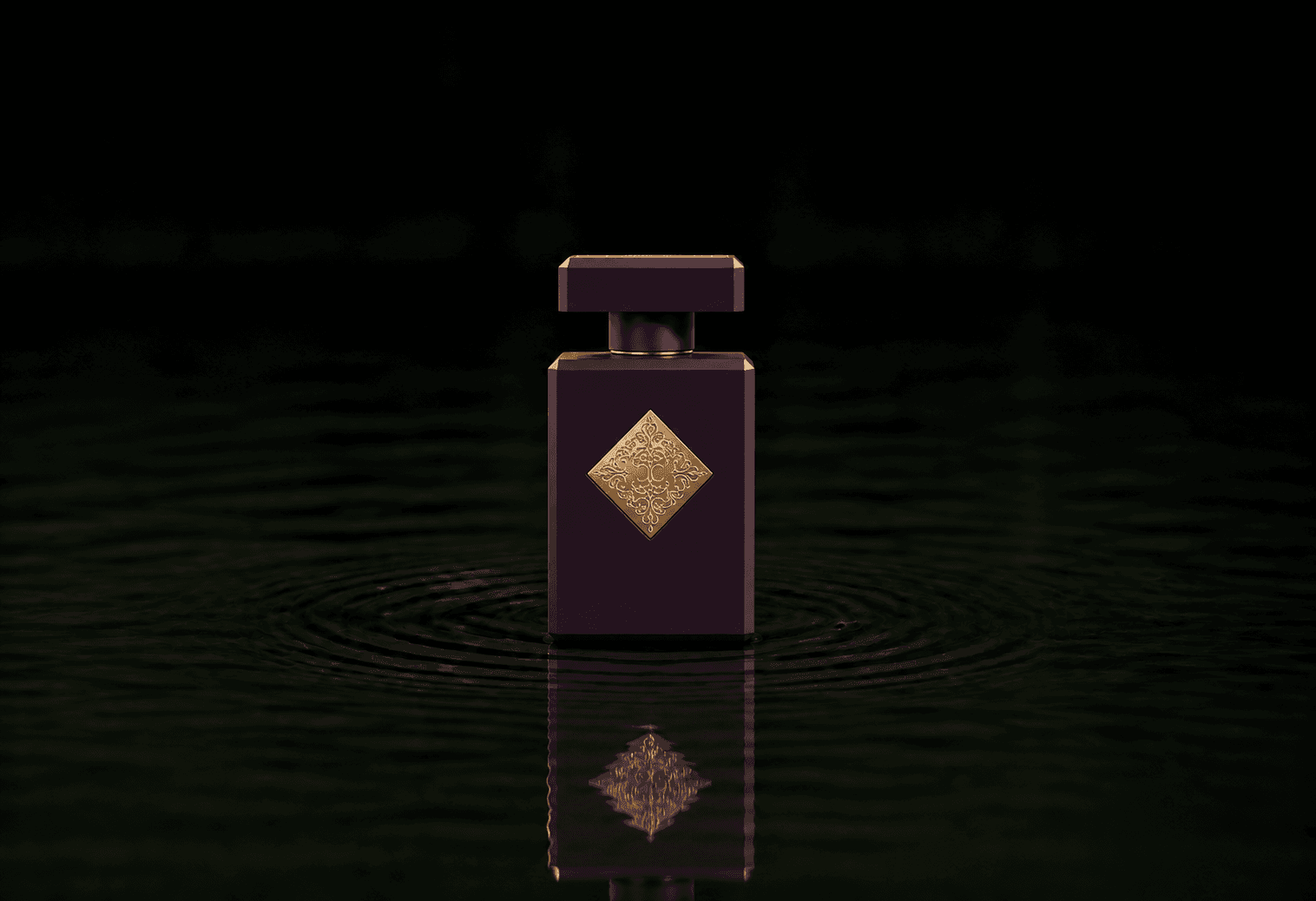 Initio Can't Get Enough fragrance bottle floating above dark water