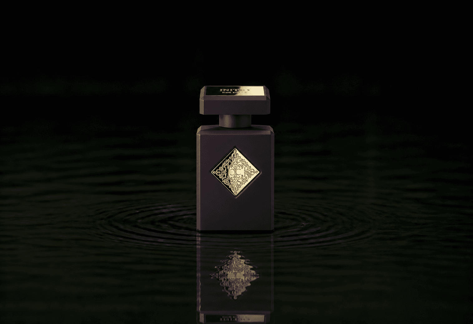 Initio Side Effect fragrance bottle floating above dark water