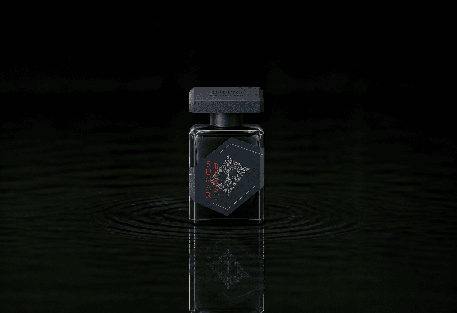 Initio Sugar Blast fragrance bottle floating above dark water