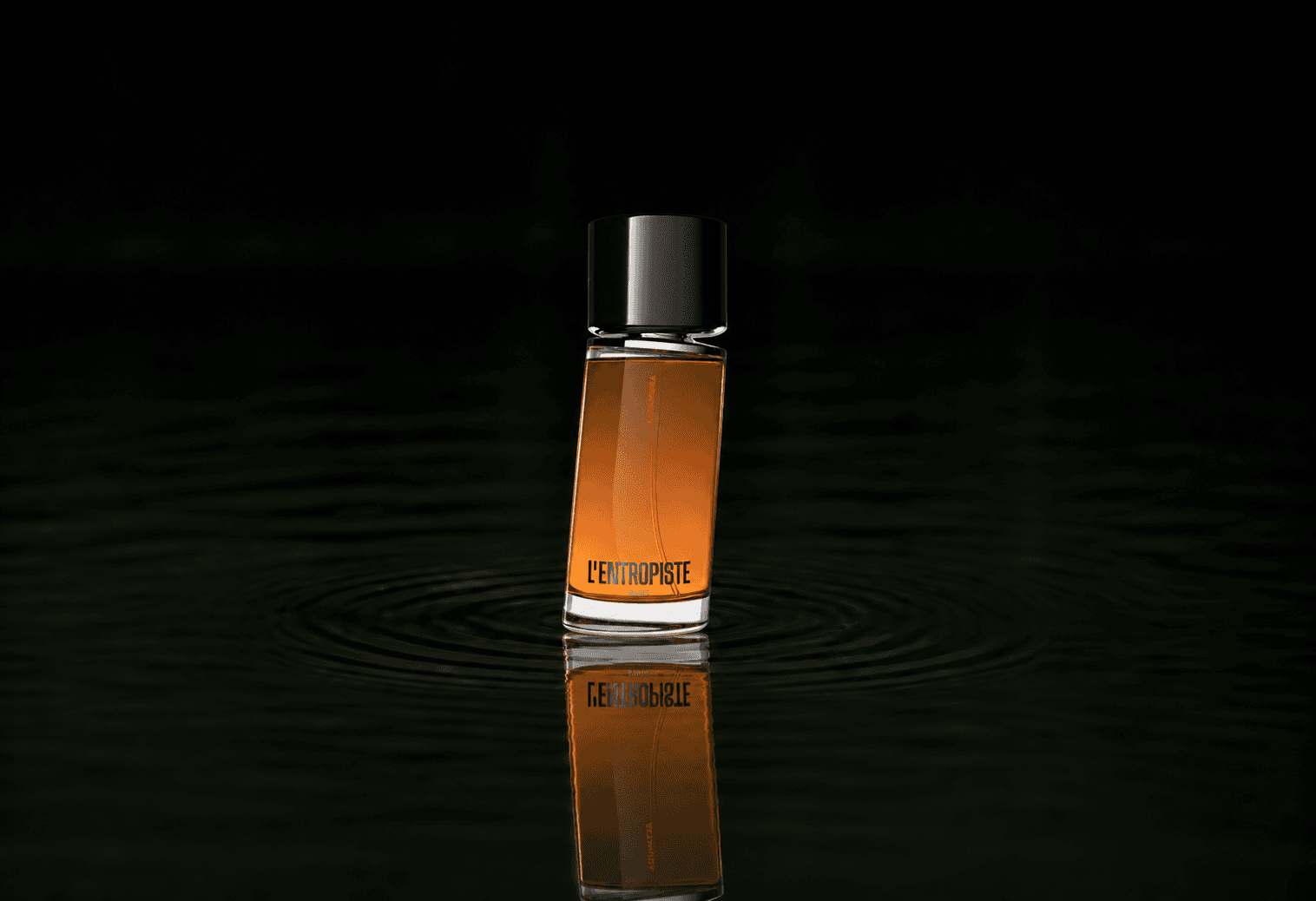 L'Entropiste Altamura fragrance bottle floating above dark water