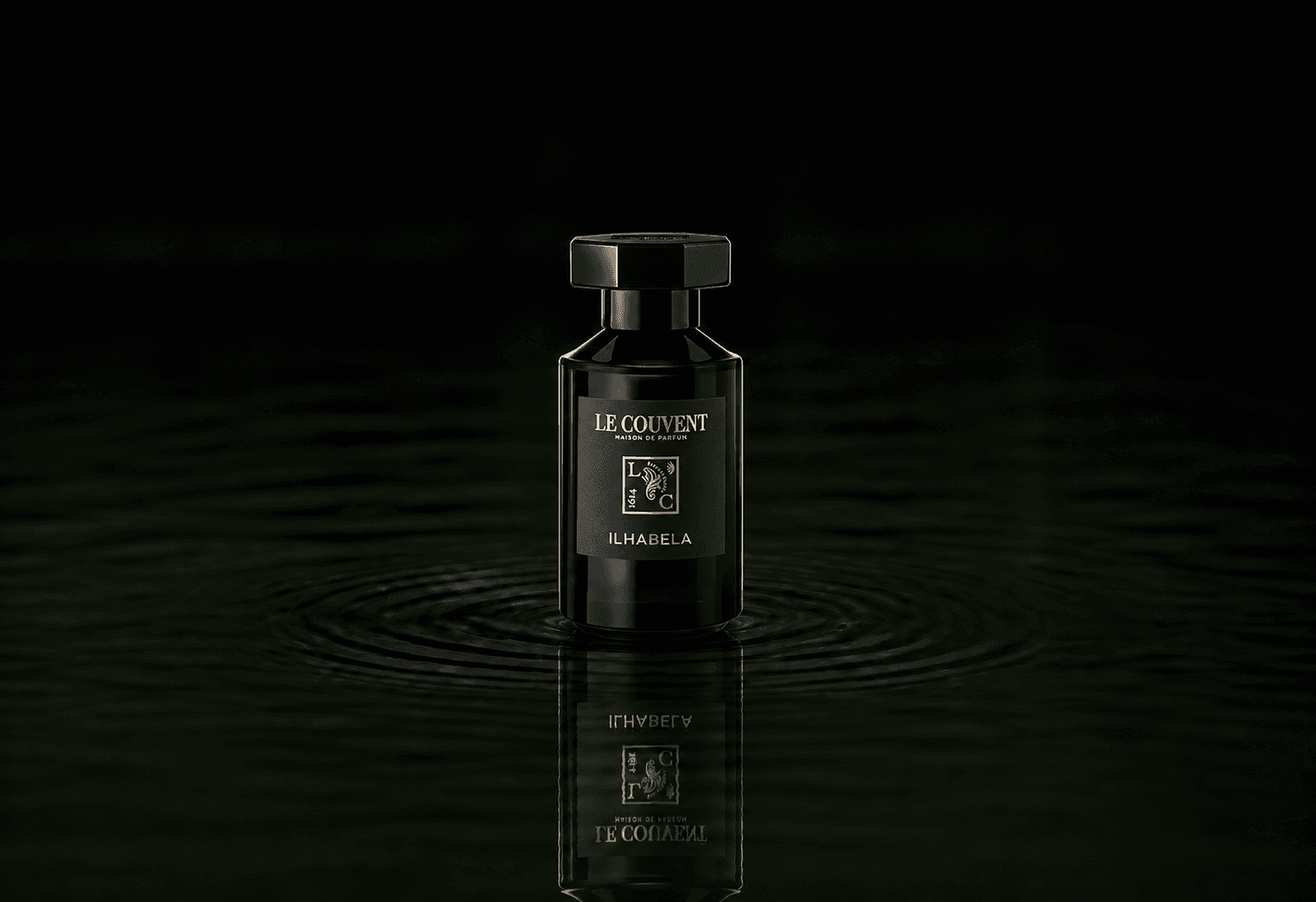 Le Couvent Maison Ilhabela fragrance bottle floating above dark water