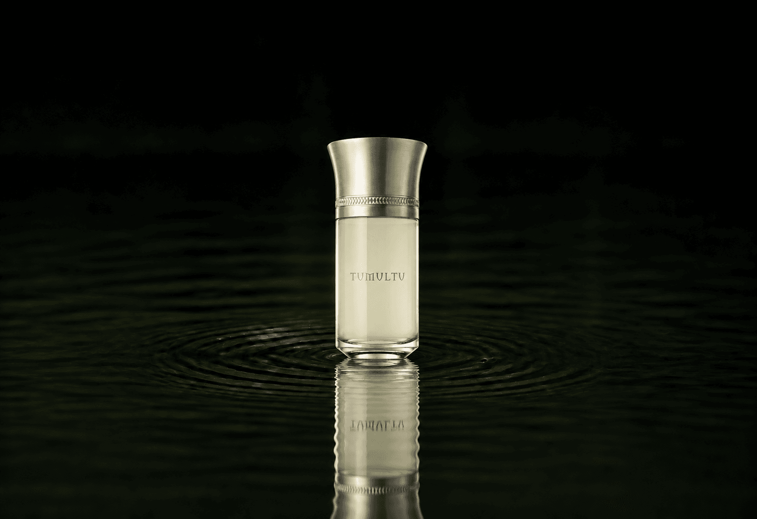 Les Liquides Imaginaires Tumultu fragrance bottle floating above dark water