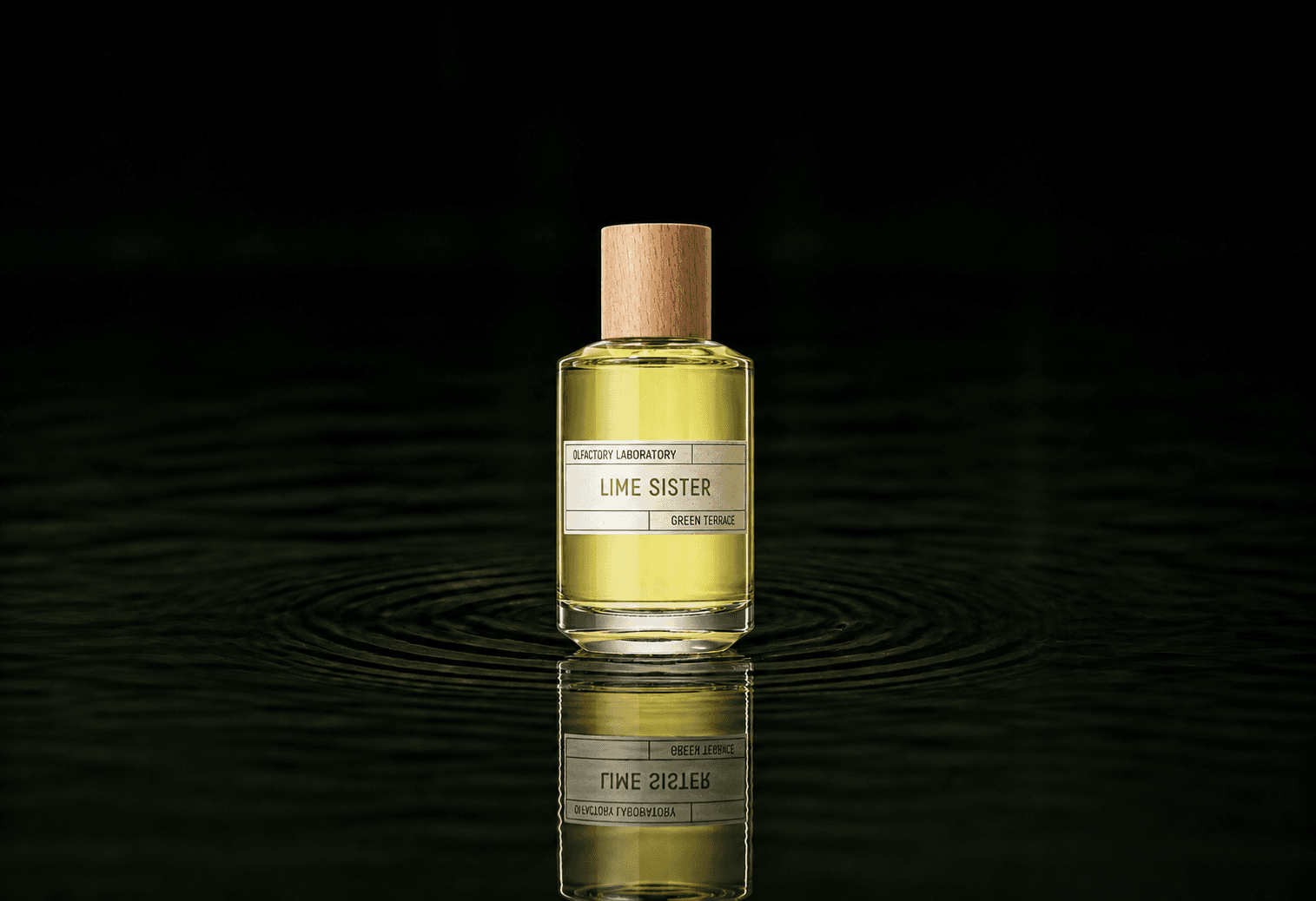 Liquides Imaginaires Lime Sister fragrance bottle floating above dark water