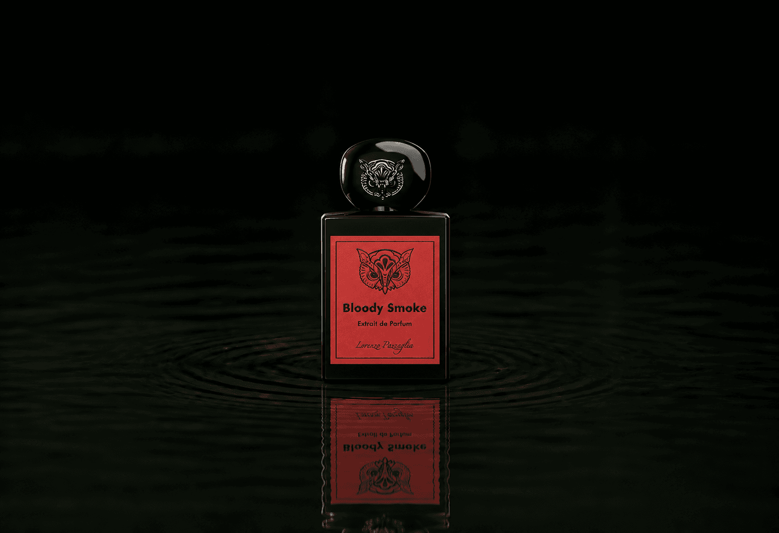 Lorenzo Pazzaglia Bloody Smoke fragrance bottle floating above dark water