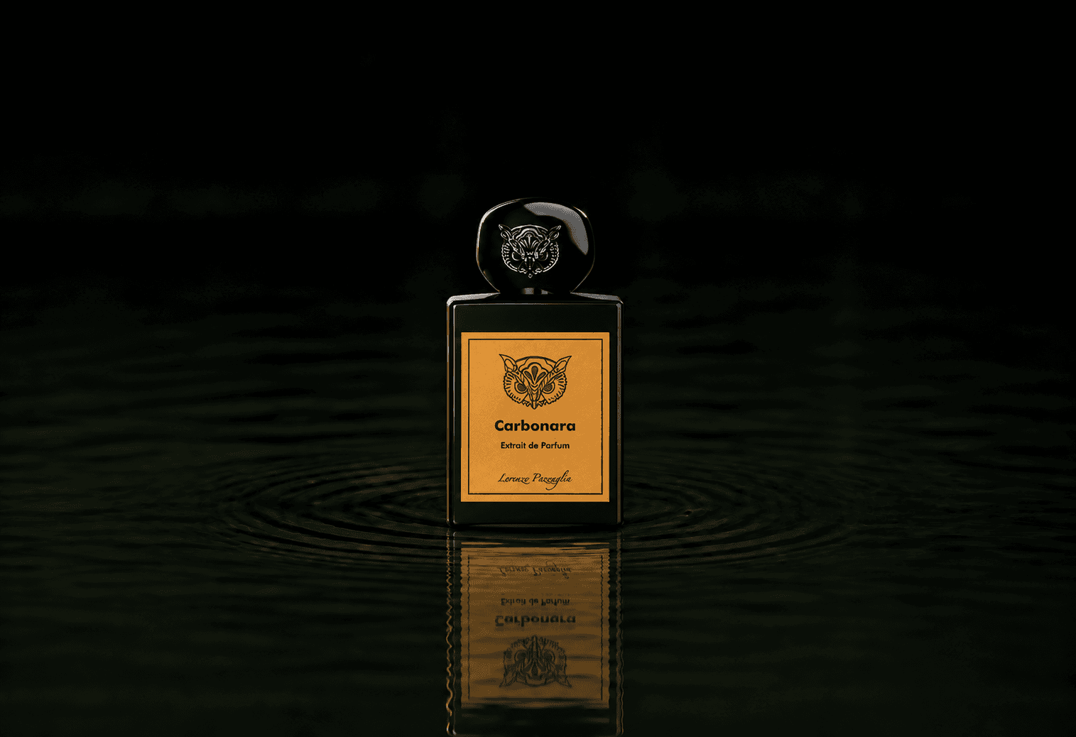 Lorenzo Pazzaglia Carbonara fragrance bottle floating above dark water