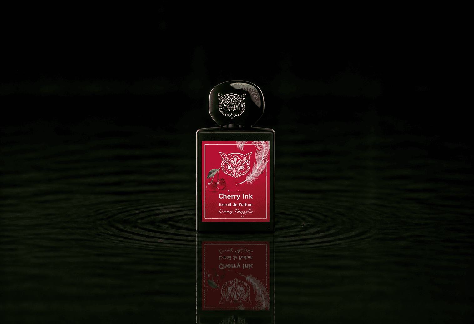 Lorenzo Pazzaglia Cherry Ink fragrance bottle floating above dark water