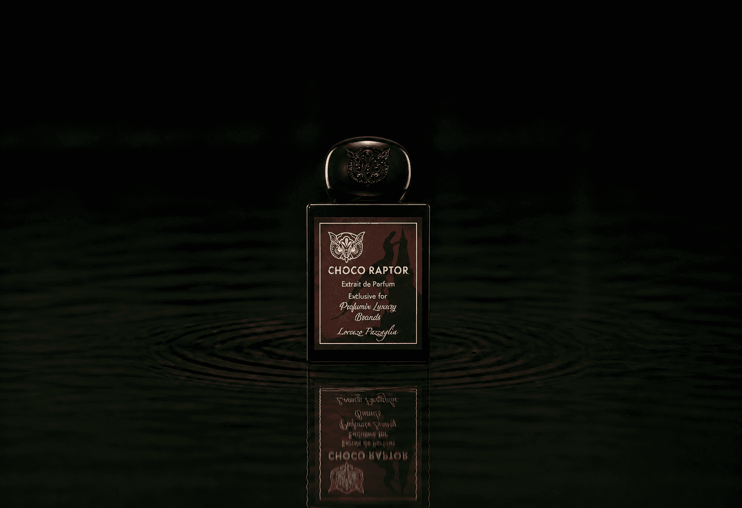 Lorenzo Pazzaglia Choco Raptor fragrance bottle floating above dark water