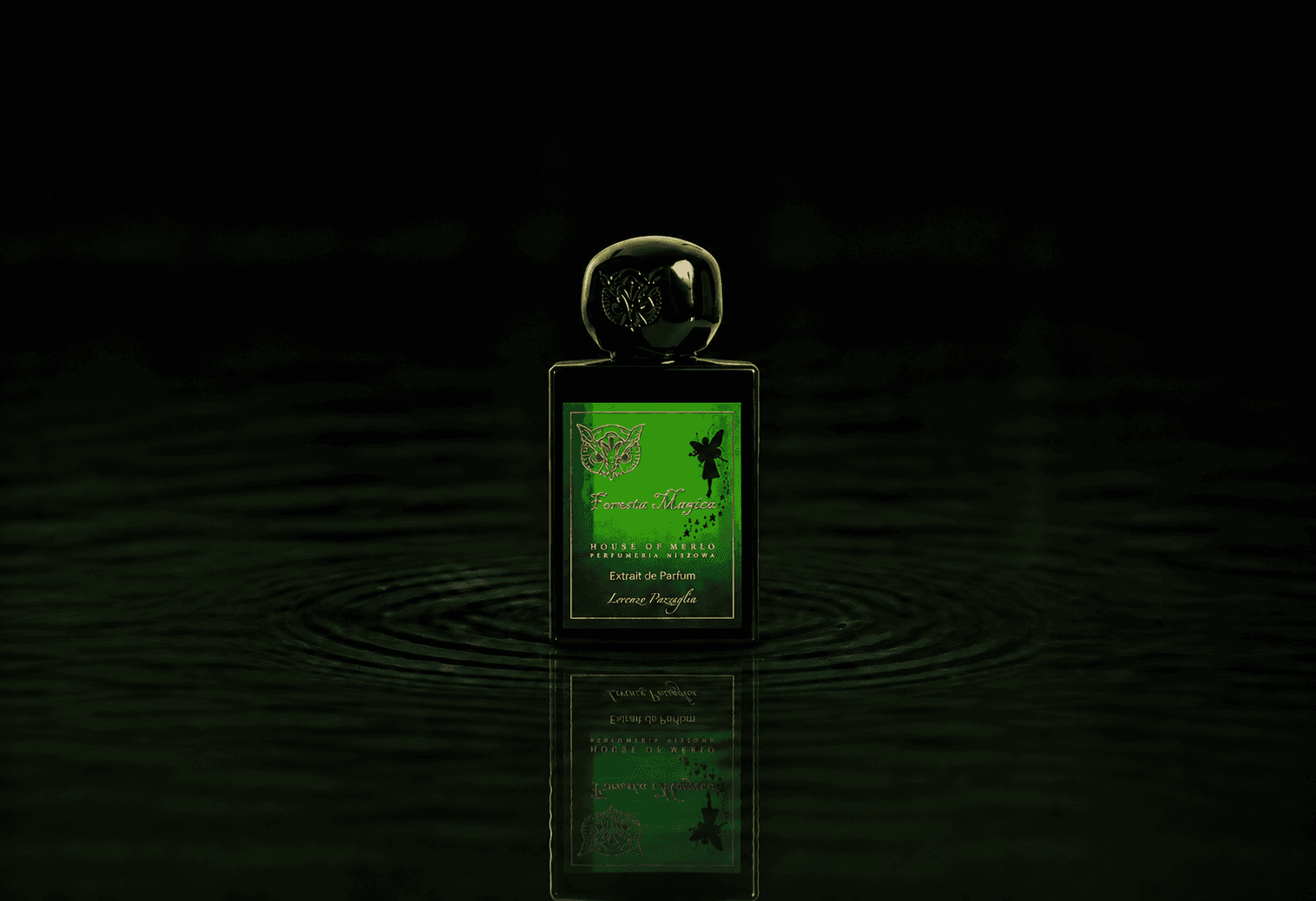 Lorenzo Pazzaglia Foresta Magica fragrance bottle floating above dark water