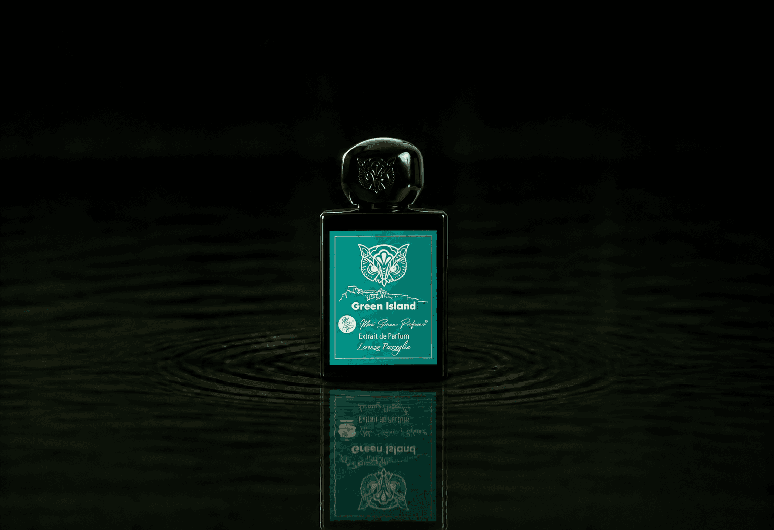 Lorenzo Pazzaglia Green Island fragrance bottle floating above dark water