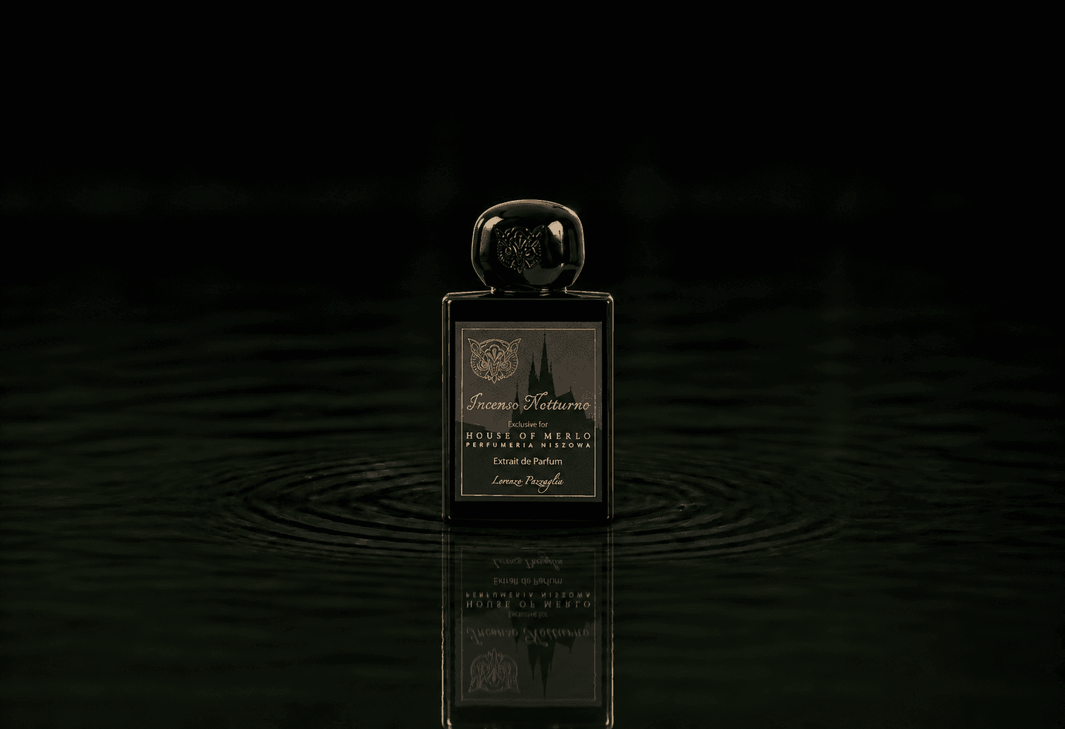 Lorenzo Pazzaglia Incenso Notturno fragrance bottle floating above dark water