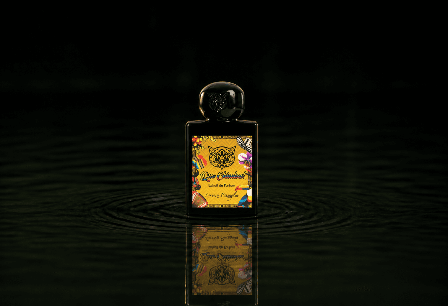 Lorenzo Pazzaglia Qué chimba fragrance bottle floating above dark water