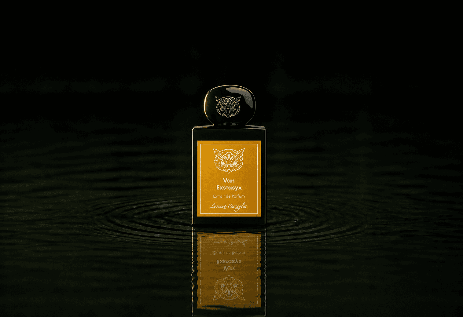 Lorenzo Pazzaglia Van Exstasyx fragrance bottle floating above dark water