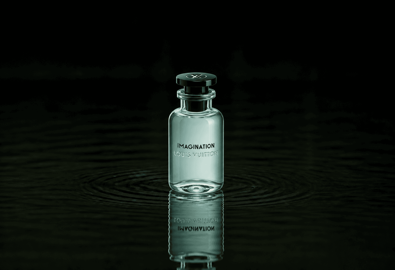 Louis Vuitton Imagination fragrance bottle floating above dark water