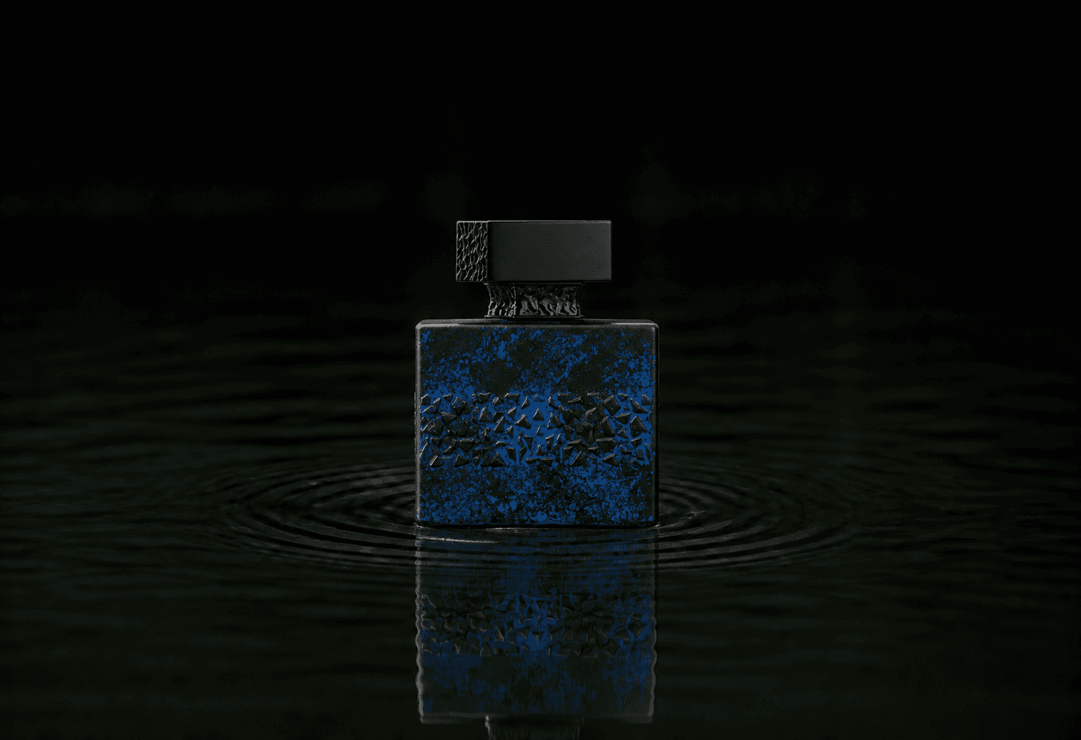M.Micallef DesirToxic L'Intense fragrance bottle floating above dark water