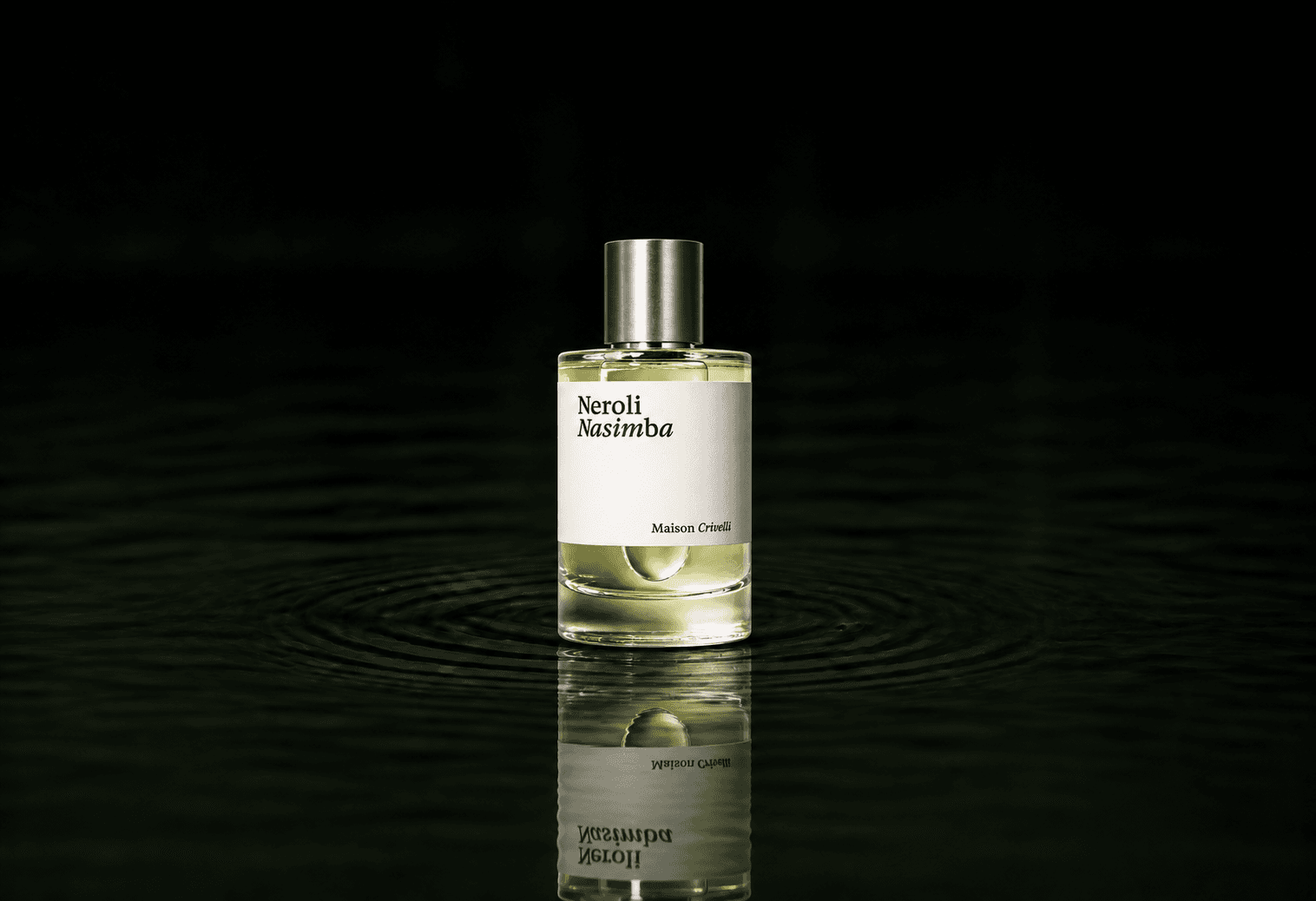 Maison Crivelli Neroli Nasimba fragrance bottle floating above dark water