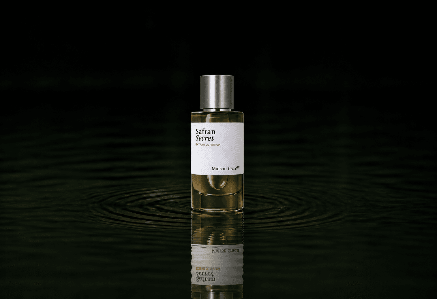 Maison Crivelli Safran Secret fragrance bottle floating above dark water