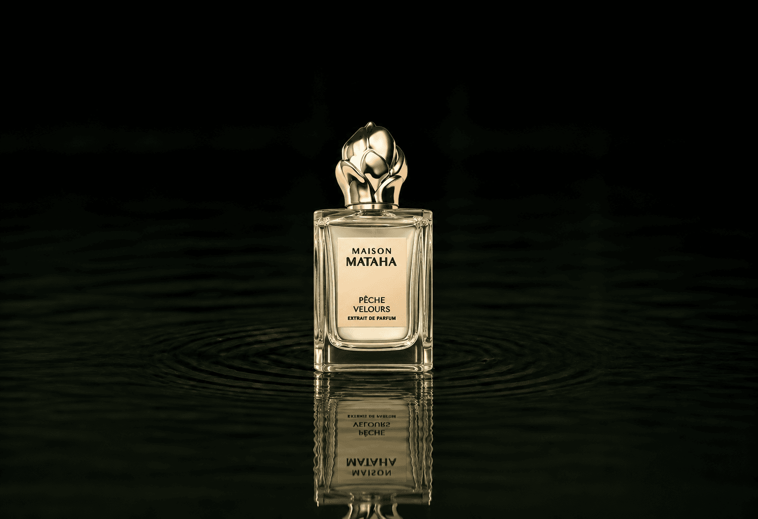 Maison Mataha Peche Velours fragrance bottle floating above dark water