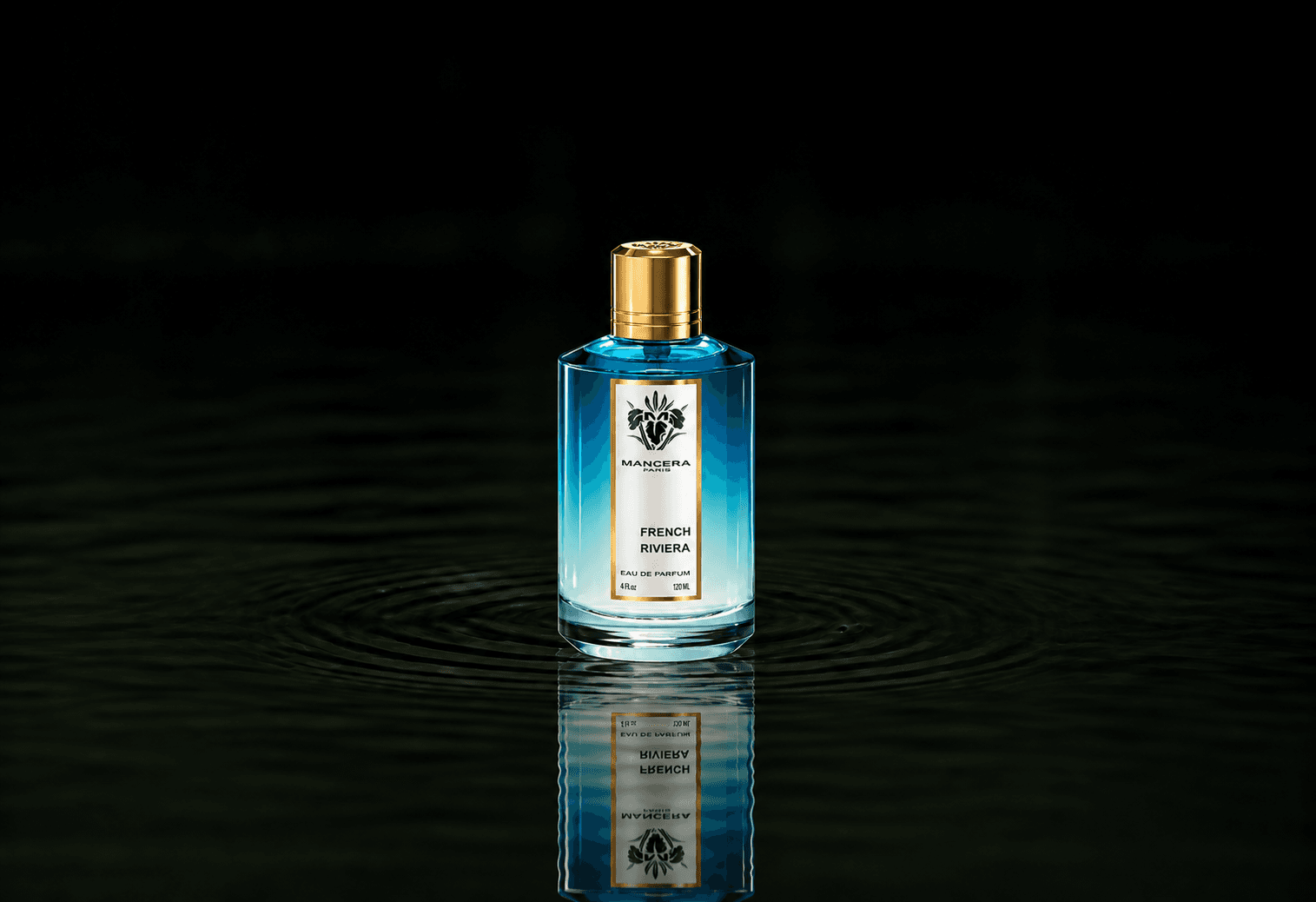 Mancera French Riviera fragrance bottle floating above dark water
