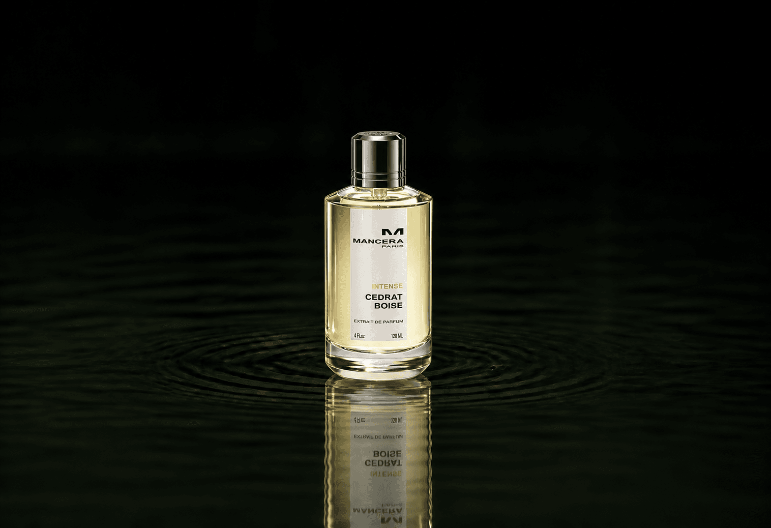Mancera Intense Cedrat Boise fragrance bottle floating above dark water