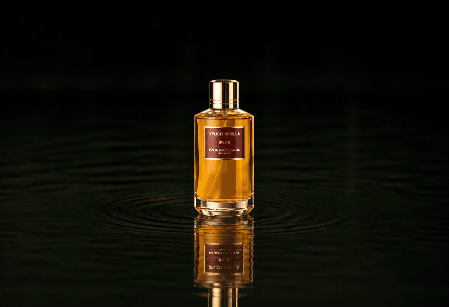 Mancera Xplicit Vanilla fragrance bottle floating above dark water