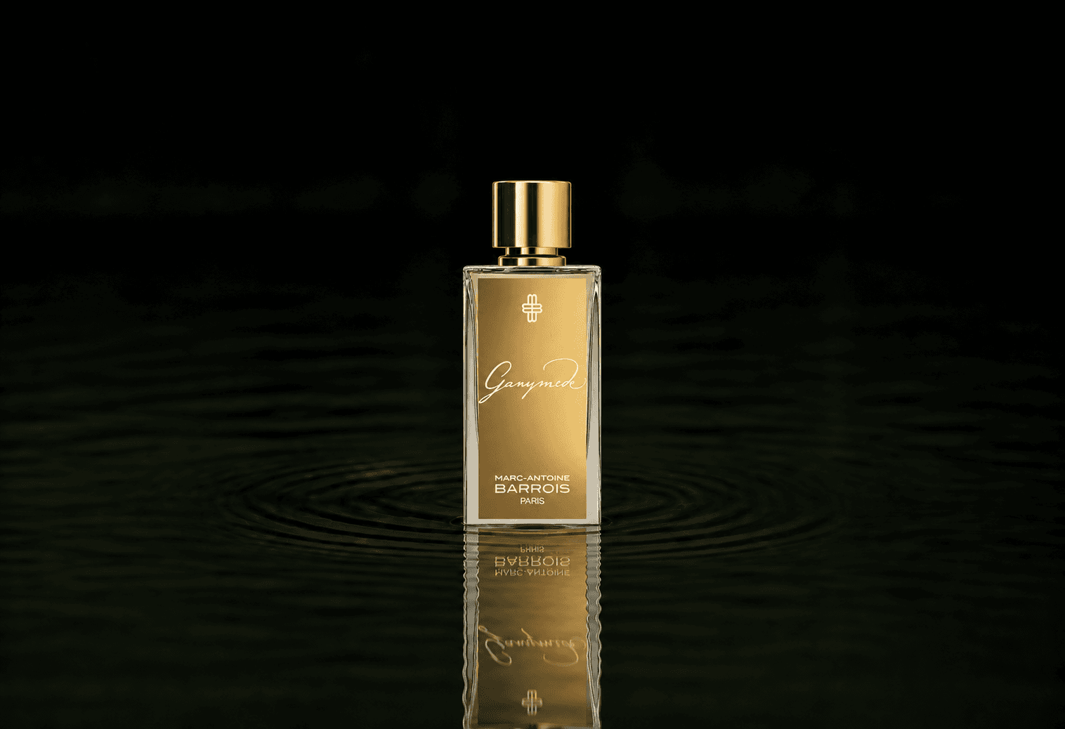 Marc-Antoine Barrois Ganymede fragrance bottle floating above dark water